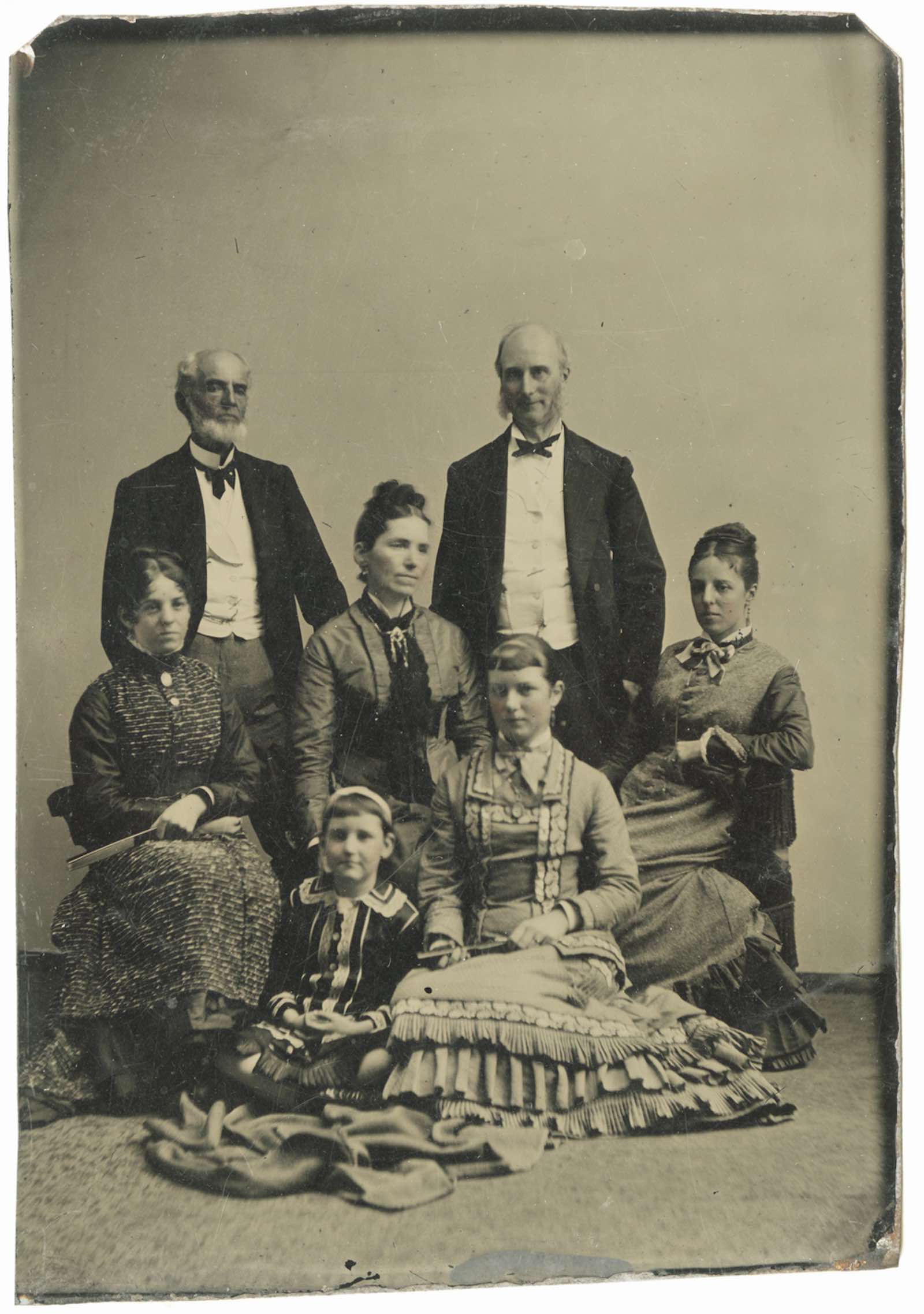 James P. Harper, Sr., Ella A. Harper, Mrs. James P. Harper, Christina Harper, Unidentified Man, and two Unidentified Young Women, 1886. Tintype.