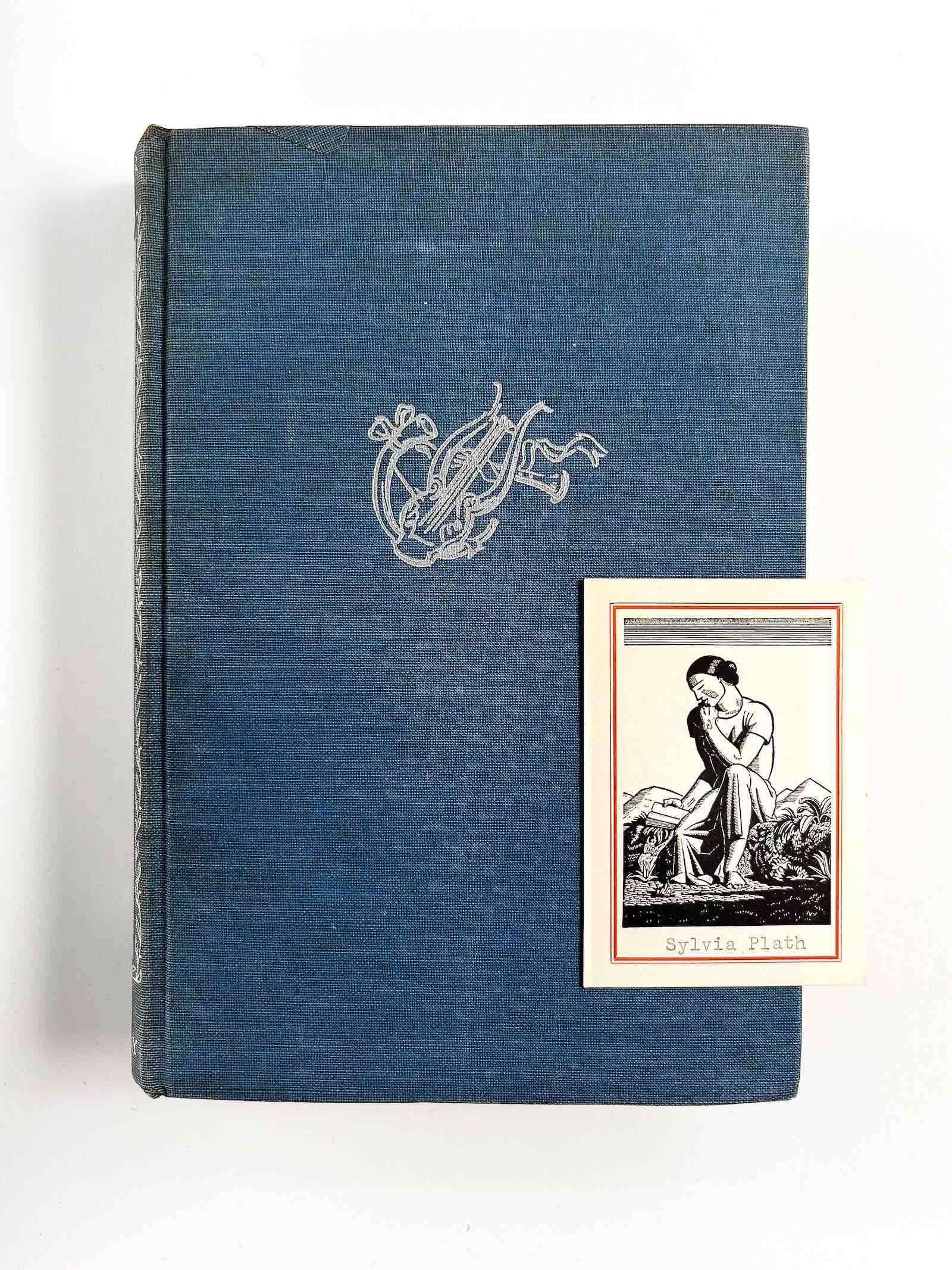 Another book from Plath's library, White Isle (1940) by Caroline Dale Snedeker, signed twice by Plath, with an original drawing by her and her bookplate laid in. Read by Plath as a tween, it is a YA novel of a young Roman girl exiled to the soggy shores of Britain and burdened with a literal-minded mother named Aurelia. $20,000.